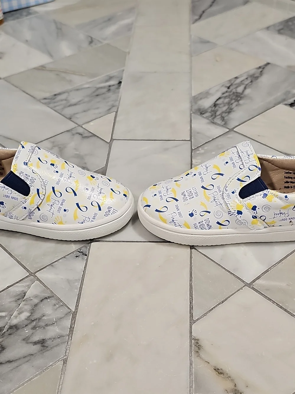 Monkey Feet White Slip-On Sneakers with Blue & Yellow Prints 12-18 Months